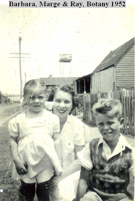 Margaret Slowgrove with family outside home, Botany 1952